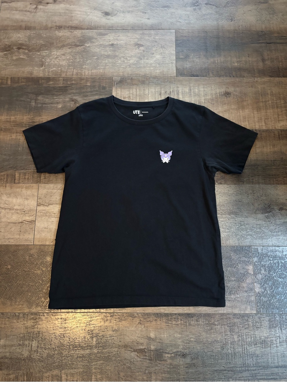 Uniqlo Karomi Black Short-Sleeve Tee with Small Purple Character